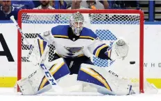  ?? CHRIS O’MEARA/THE ASSOCIATED PRESS ?? Goalie Jordan Binnington has carried St. Louis back into the playoff picture after a slow start to the season.