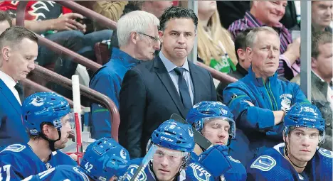  ?? JEFF VINNICK/NHLI VIA GETTY IMAGES ?? Head coach Travis Green and his Vancouver Canucks are 1-2-1 following their first four games of the season, all on home ice at Rogers Arena, and now head out on a five-game road trip that will likely give fans a good idea of what this team’s prospects...
