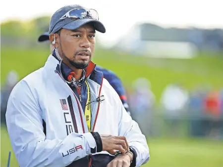  ?? JOHN DAVID MERCER/USA TODAY SPORTS ?? Tiger Woods served as a vice captain during the 41st Ryder Cup at Hazeltine National Golf Club in 2016.