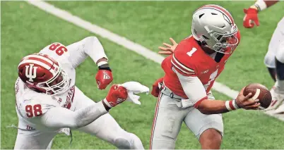  ?? JOSHUA A. BICKEL/COLUMBUS DISPATCH ?? Justin Fields has been Ohio State’s most dynamic player. But the junior has a tendency to try to make big plays when nothing is available, which can put the Buckeyes in a vulnerable position.