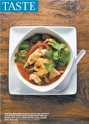  ?? PHOTOS BY DOUGLAS MERRIAM ?? Chef Nou Kimnath won best savory soup and best overall soup at this year’s Souper Bowl with her chicken tom yum, a distinctiv­ely tangy, usually spicy Thai soup.