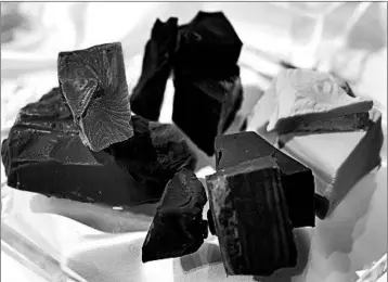  ?? AKIO KON/BLOOMBERG PHOTOS ?? Millennial­s are keen to try new chocolate varieties, prompting companies to produce more flavors and artisan brands.