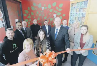  ??  ?? Grace House corporate tree unveiled with, front from left, CEO Victoria Brown, business developmen­t manager Jane Lertas-Robinson and chairman David Cook.