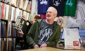  ?? Photograph: Christophe­r Thomond/The Guardian ?? Counter culture … Guardian music writer Dave Simpson hard at work in Jumbo Records, Leeds.