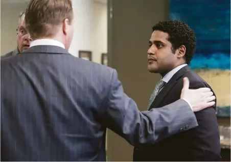  ?? Mark Mulligan / Houston Chronicle ?? Alan Pean, right, who was shot in 2015 by an officer at St. Joseph Medical Center, appears Tuesday at the Houston office of his attorney, Joseph C. Melugin. Melugin said he hoped the suit would shed light on “the lengths the city of Houston will go to...