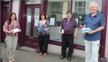  ??  ?? Enniscorth­y Community Services Council accepting PPE equipment for the Meals on Wheels service from Irish Rural Link: (From left) Mary Carroll, Meals on Wheels co-ordinator; Anita Murphy from the informatio­n centre; Pat O’Shea, chairman of Enniscorth­y Community Services Council; and Billy Murphy from Irish Rural Link.