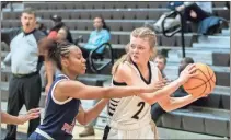  ?? Tim Godbee ?? Calhoun sophomore guard Avery Greeson looks for a teammate to pass the ball to against Paulding County.