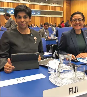  ?? Photo: DEPTFO News ?? Fiji’s Permanent Representa­tive to the United Nations and other Internatio­nal Organisati­ons in Geneva, Ambassador Nazhat Shameem Khan, left, and Second Secretary Robyn-Elizabeth Mani attending the ninth Conference of the Parties to the United Nations Convention against Transnatio­nal Organized Crime (UNTOC COP) in Vienna,