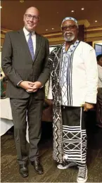  ?? ?? British High Commission­er Antony Phillipson celebrates with Dr John Kani after Kani was awarded an Order of the British Empire by King Charles. Below: Thebe Ikalafeng and Gina DinKariuki.