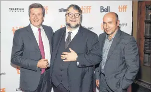  ?? CP PHOTO ?? Toronto Mayor John Tory, left, director Guillermo del Toro and producer J. Miles Dale attend the premiere for “The Shape of Water”, on day 5 of the Toronto Internatio­nal Film Festival, at the Elgin Theatre on Monday, Sept. 11, 2017, in Toronto. Toronto...