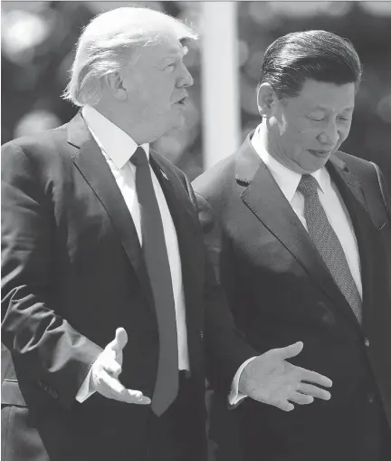  ?? JIM WATSON/AFP/GETTY IMAGES ?? U.S. President Donald Trump’s confrontat­ional talk about America’s trade partners had resonated with many voters on the campaign trail, but he softened his trade stance on China since his meeting last week with Chinese President Xi Jinping, above.