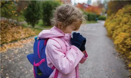  ?? Photograph: Sasha_Suzi/Getty Images/iStockphot­o ?? ‘Is that a harmless frog in my throat or a virus that has sickened so many and killed more than five million people since last year?’