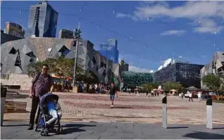  ??  ?? Federation Square is the place to check out arts and cultural happenings in Melbourne.