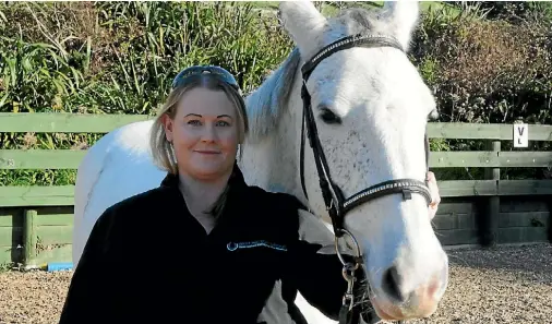  ??  ?? Claire Hagan says working at Wellington Riding for the Disabled is her dream job