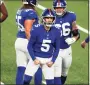  ?? Adam Hunger / Associated Press ?? New York Giants kicker Graham Gano (5) reacts after making a field goal during an NFL game against the Philadelph­ia Eagles on Sunday in East Rutherford, N.J.