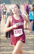  ?? Graham Thomas/Herald-Leader ?? Siloam Springs junior Chloe McGooden finished ninth overall with a time of 20:58.5 on Friday at the Class 6A cross country meet at Oaklawn Park in Hot Springs.