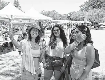  ?? Charlie Blalock/Contributo­r ?? Nimsi Coronado, from left, Katherine Soto, Jeanny Sanchez and Elisa Castro take a selfie during Saturday’s Pride Bigger Than Texas Parade and Festival-San Antonio at Crockett Park.