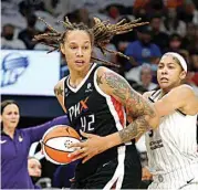  ?? RALPH FRESO /AP, FILE ?? Phoenix Mercury center Brittney Griner (42) drives past Chicago Sky forward Candace Parker (3) during the first half of Game 1 of the WNBA basketball Finals on Oct. 10, 2021 in Phoenix.