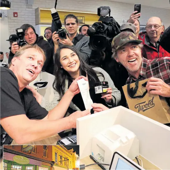  ?? Pictures: AFP, REUTERS ?? JOINT ENTERPRISE: (l-r) Canopy Growth CEO Bruce Linton with Nikki Rose and Ian Power, who were first in line to buy the recreation­al marijuana