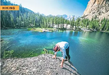  ?? VISIT IDAHO ?? Elephant’s Perch towers above the trees in the Sawtooth Wilderness and is considered one of the best hikes in Idaho.