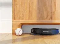  ??  ?? The low profile of robot vacuums enables them to fit under tricky furniture so that hard-to-reach areas can be cleaned.