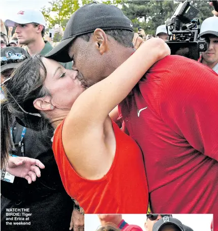 ?? Picture: GETTY ?? WATCH THE BIRDIE: Tiger and Erica at the weekend