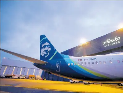  ?? ?? An Alaska Airlines Boeing 737 Max 9 awaits inspection at the airline’s hangar at Seattle-Tacoma Internatio­nal Airport.