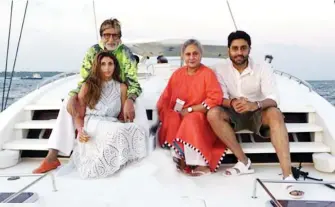  ??  ?? ADVOCATING FOR CHANGE: Amitabh with Abhishek, Shweta and Jaya