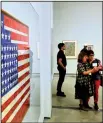  ?? AP/RICHARD VOGEL ?? Jasper Johns’ flag paintings are drawing crowds to The Broad in Los Angeles, where “Something Resembling Truth,” the first major survey of the artist’s work to be shown in Los Angeles, will remain on display through May 13.