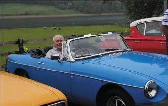  ??  ?? Club Chairman Tommy Flynn in his 1978 MG Roadster.