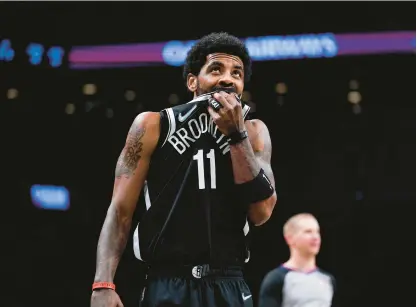  ?? SETH WENIG/AP ?? Brooklyn Nets guard Kyrie Irving will need to prove his commitment to GM Sean Marks if he wants to move foward with the team.