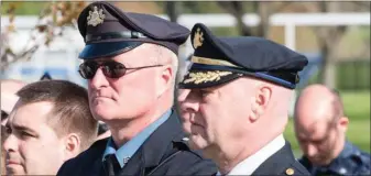  ?? PHOTO FROM NEW HANOVER TOWNSHIP WEBSITE ?? New Hanover Police Sgt. William Mover, center, and Chief Kevin McKeon, right.