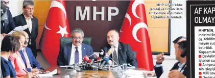  ??  ?? MHP’li Feti Yıldız (solda) ve Erhan Usta af teklifiyle ilgili basın toplantısı düzenledi.