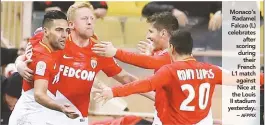  ?? AFPPIX ?? Monaco’s Radamel Falcao (L) celebrates after scoring during their French L1 match against Nice at the Louis II stadium yesterday. –