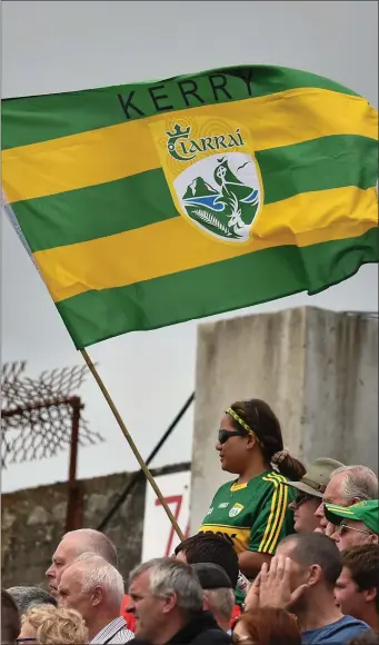 ??  ?? A Kerry supporter flies her flagduring a clash between Cork and Kerry in Fitzgerald Stadium