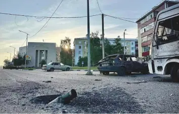  ?? Reuters ?? Ammunition casing in a street following Ukrainian shelling in the town of Shebekino in the Belgorod region yesterday. Shells damaged an apartment building, four homes and a school.