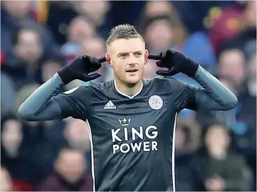  ??  ?? LEICESTER City’s Jamie Vardy celebrates scoring the first of his two goals against Aston Villa at Villa Park yesterday. | REUTERS