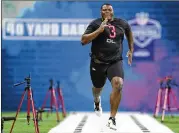  ?? MICHAEL CONROY / ASSOCIATED PRESS ?? Auburn defensive lineman Derrick Brown runs the 40-yard dash at the NFL football scouting combine in Indianapol­is on Feb. 29.