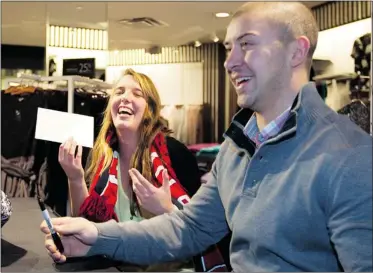  ?? PIERRE OBENDRAUF/ THE GAZETTE ?? Brianna Thicke is all smiles after receiving an autograph from Josh Gorges during an event in a Montreal store Tuesday.