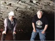  ?? MEDIANEWS GROUP FILE PHOTO ?? A few months ago, Pottstown Borough Manager Justin Keller and State Rep. Tim Hennessey, R-26th Dist., got a closer look the stormwater arch that collapsed behind Walnut Street last May.