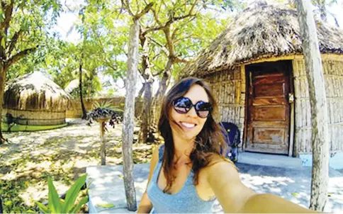  ?? — WP-Bloomberg photos ?? “It’s all right to go off and do your own thing,” says Kristin Addis, seen here in Mozambique.