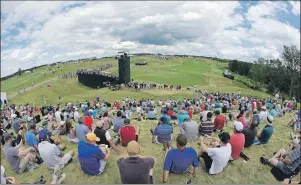  ?? AP PHOTO ?? In this June 18, photo, Xander Schauffele putts on the third green during the fourth round of the U.S. Open golf tournament at Erin Hills in Erin, Wis. Crowds where kept farther away from the action at Erin Hills than at most U.S. Opens.