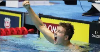  ?? MICHAEL CONROY — THE ASSOCIATED PRESS ?? True Sweetser celebrates after winning the men’s 1,500-meter freestyle in Indianapol­is on Tuesday.