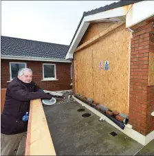  ?? Photo by Domnick Walsh ?? Councillor Robert Beasley at the scene of the storm damage to the Respond Housing units in Ballybunio­n.