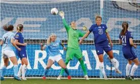  ?? Photograph: Jason Cairnduff/Action Images/Reuters ?? Ann-Katrin Berger pulls off a stunning and vital late save to preserve a point for Chelsea at Manchester City.