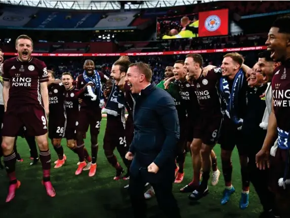  ?? (Getty) ?? Brendan Rodgers celebrates with his squad