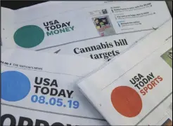  ?? ASSOCIATED PRESS ?? Sections of a USA Today newspaper lie on display, Aug. 5, 2019, in Norwood, Mass.