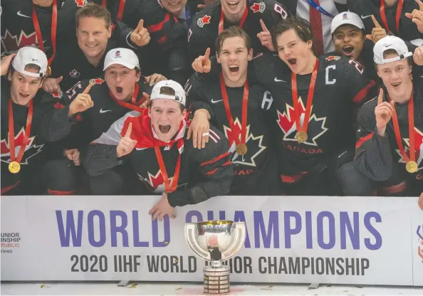  ?? RYAN REMIORZ / THE CANADIAN PRESS ?? The kids on Team Canada deal with the pressure of 37 million people counting on them to win a gold medal, and anything less is considered a failure.