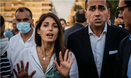  ?? ?? Mayor Virginia Raggi campaignin­g in Ostia with Italian foreign minister Luigi Di Maio. Photograph: Alessandro Serranò/Rex