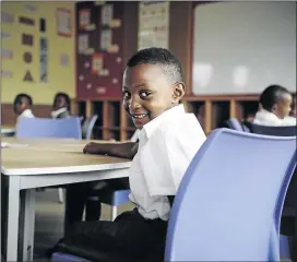  ?? PHOTO: THULANI MBELE ?? Precious Rasebotsa was happy to start Grade 1 at the new Nomzamo Madikezela-Mandela Primary in Braamfisch­erville.